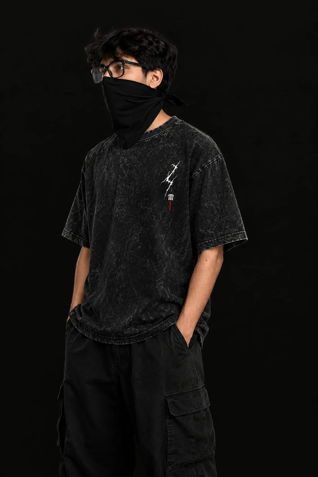 Man wearing the Static Surge oversized tee with black cargo trousers, seen from the side