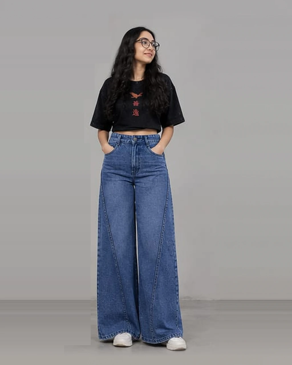 Front view of Zentoku Asymmetrical Seam Indigo 14.5 OZ denim featuring sculptural diagonal panel seams and relaxed wide leg drape